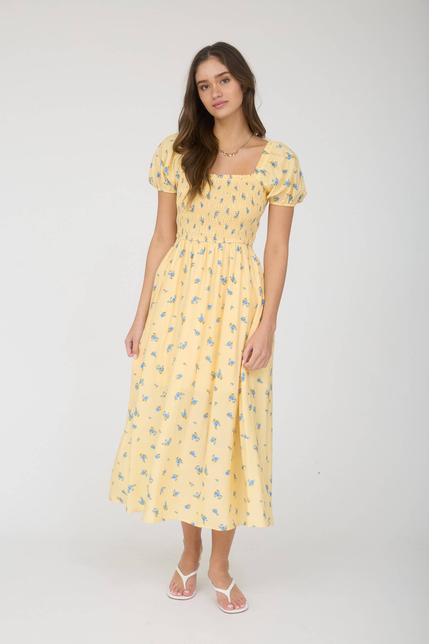 VESTIDO MIDI FLORAL CON MANGAS ABULLONADAS FRUNCIDAS