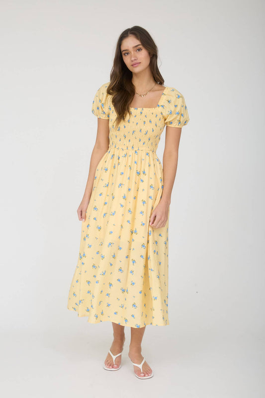 VESTIDO MIDI FLORAL CON MANGAS ABULLONADAS FRUNCIDAS